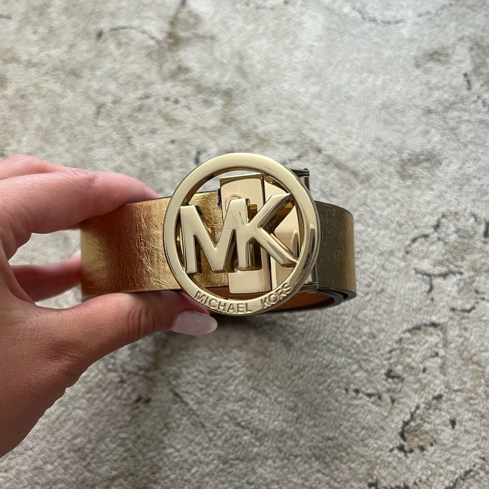 Reversible gold and brown Michael Kors belt.